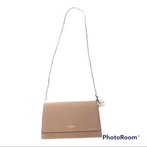 Super cute light pink cross body bag.